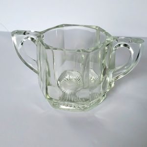 Vintage , heavy,, clear glass sugar bowl. Star pressed bottom